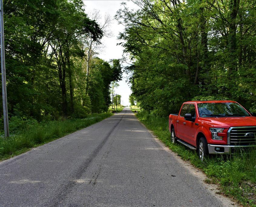 05. Paved Road Frontage_wooded